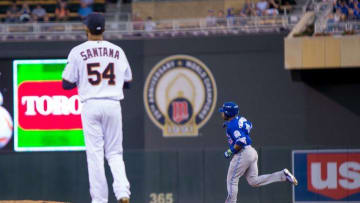 May 19, 2016; Minneapolis, MN, USA; Toronto Blue Jays designated hitter Edwin Encarnacion (10) hits home run in the seventh inning against the Minnesota Twins starting pitcher Ervin Santana (54) at Target Field. Mandatory Credit: Brad Rempel-USA TODAY Sports