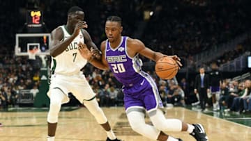 MILWAUKEE, WI - NOVEMBER 04: Harry Giles #20 of the Sacramento Kings drives around Thon Maker #7 of the Milwaukee Bucks during a game at the Fiserv Forum on November 4, 2018 in Milwaukee, Wisconsin. NOTE TO USER: User expressly acknowledges and agrees that, by downloading and or using this photograph, User is consenting to the terms and conditions of the Getty Images License Agreement. (Photo by Stacy Revere/Getty Images)