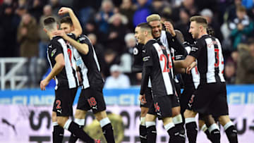 NEWCASTLE UPON TYNE, ENGLAND - NOVEMBER 09: Ciaran Clark of Newcastle United celebrates with teammates after scoring his team's second goal during the Premier League match between Newcastle United and AFC Bournemouth at St. James Park on November 09, 2019 in Newcastle upon Tyne, United Kingdom. (Photo by Nathan Stirk/Getty Images)