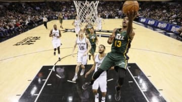 Jan 18, 2015; San Antonio, TX, USA; Utah Jazz shooting guard Elijah Millsap (13) shoots the ball during the second half against the San Antonio Spurs at AT&T Center. The Spurs won 89-69. Mandatory Credit: Soobum Im-USA TODAY Sports