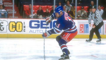 LANDOVER, MD - NOVEMBER 09: Mark Messier #11 of the New York Rangers skates with the puck during a NHL hockey game against the Washington Capitals on November 9, 1996 at the USAir Arena in Landover, Maryland. (Photo by Mitchell Layton/Getty Images)