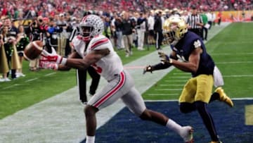 Jan 1, 2016; Glendale, AZ, USA; Ohio State Buckeyes wide receiver Michael Thomas (3) drops a pass as Notre Dame Fighting Irish cornerback Nick Watkins (21) defends during the second half in the 2016 Fiesta Bowl at University of Phoenix Stadium. Mandatory Credit: Matt Kartozian-USA TODAY Sports
