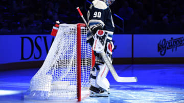 COLUMBUS, OHIO - JANUARY 19: Elvis Merzlikins #90 of the Columbus Blue Jackets stands in the net during introductions before the first period against the Anaheim Ducks at Nationwide Arena on January 19, 2023 in Columbus, Ohio. (Photo by Emilee Chinn/Getty Images)