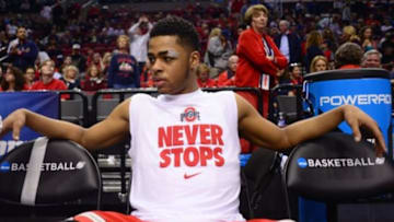 Mar 19, 2015; Portland, OR, USA; Ohio State Buckeyes guard D'Angelo Russell (0) dribbles against Virginia Commonwealth Rams guard/forward Treveon Graham (21) during the first half in the second round of the 2015 NCAA Tournament at Moda Center. Mandatory Credit: Godofredo Vasquez-USA TODAY Sports