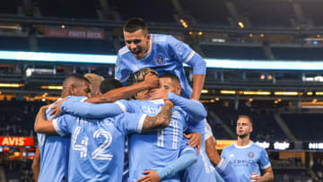 Oct 23, 2021; New York, New York, USA; New York City FC players celebrate after a goal against D.C. United during the first half at Yankee Stadium. Mandatory Credit: Vincent Carchietta-USA TODAY Sports
