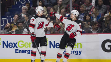 New Jersey Devils forward Yegor Sharangovich (17) and forward Jesper Boqvist (70) celebrate Sharangovich’s goal against the Vancouver Canucks in the second period at Rogers Arena. Mandatory Credit: Bob Frid-USA TODAY Sports