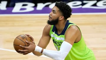 Karl-Anthony Towns #32 of the Minnesota Timberwolves stands at the line to shoot a foul shot against the Sacramento Kings during the first half of an NBA basketball game at Golden 1 Center on April 21, 2021 in Sacramento, California. NOTE TO USER: User expressly acknowledges and agrees that, by downloading and or using this photograph, User is consenting to the terms and conditions of the Getty Images License Agreement. (Photo by Thearon W. Henderson/Getty Images)