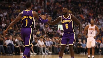 PHOENIX, AZ - OCTOBER 24: Lance Stephenson #6 of the Los Angeles Lakers high fives Kentavious Caldwell-Pope #1 during the first half of the NBA game against the Phoenix Suns at Talking Stick Resort Arena on October 24, 2018 in Phoenix, Arizona. The Lakers defeated the Suns 131-113. NOTE TO USER: User expressly acknowledges and agrees that, by downloading and or using this photograph, User is consenting to the terms and conditions of the Getty Images License Agreement. (Photo by Christian Petersen/Getty Images)