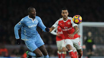 LONDON, ENGLAND - DECEMBER 10: Theo Walcott of Arsenal closes down Giannelli Imbula of Stoke during the Premier League match between Arsenal and Stoke City at Emirates Stadium on December 10, 2016 in London, England. (Photo by David Price/Arsenal FC via Getty Images)