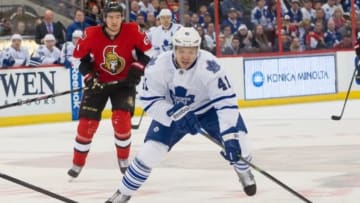 Apr 12, 2014; Ottawa, Ontario, CAN; Toronto Maple Leafs left wing Nikolai Kulemin (41) skates with the puck in the first period against the Ottawa Senators at the Canadian Tire Centre. Mandatory Credit: Marc DesRosiers-USA TODAY Sports
