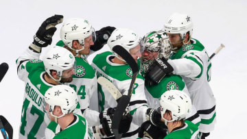 EDMONTON, ALBERTA - AUGUST 20: The Dallas Stars celebrate their victory over the Calgary Flames in Game Six of the Western Conference First Round during the 2020 NHL Stanley Cup Playoffs at Rogers Place on August 20, 2020 in Edmonton, Alberta, Canada. The Stars defeated the Flames 7-3 to win the Round One Western Playoff series 4-2. (Photo by Jeff Vinnick/Getty Images)