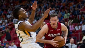 Miami Heat guard Goran Dragic (0) drives the ball against Utah Jazz's Donovan Mitchell (45) in the fourth quarter on Sunday, Jan. 7, 2018 at the AmericanAirlines Arena in Miami, Fla. The Miami Heat defeated the Utah Jazz, 103-102. (Matias J. Ocner/Miami Herald/TNS via Getty Images)