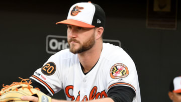 BALTIMORE, MD - APRIL 09: Mike Wright #43 of the Baltimore Orioles stands in the dugout before the game against the Oakland Athletics at Oriole Park at Camden Yards on April 9, 2019 in Baltimore, Maryland. (Photo by G Fiume/Getty Images)