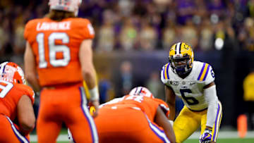 NEW ORLEANS, LOUISIANA - JANUARY 13: Jacob Phillips #6 of the LSU Tigers eyes Trevor Lawrence #16 of the Clemson Tigers during the second quarter of the College Football Playoff National Championship game at the Mercedes Benz Superdome on January 13, 2020 in New Orleans, Louisiana. The LSU Tigers topped the Clemson Tigers, 42-25. (Photo by Alika Jenner/Getty Images)