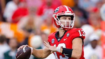 ATHENS, GA - NOVEMBER 05: Stetson Bennett #13 of the Georgia Bulldogs drops back to pass in the second half against the Tennessee Volunteers at Sanford Stadium on November 5, 2022 in Athens, Georgia. (Photo by Todd Kirkland/Getty Images)