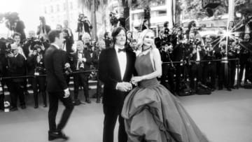 CANNES, FRANCE - MAY 24: (EDITORS NOTE: Image has been converted to black and white, and a starburst filter used in camera) Norman Reedus and Diane Kruger attend the 75th Anniversary celebration screening of "The Innocent (L'Innocent)" during the 75th annual Cannes film festival at Palais des Festivals on May 24, 2022 in Cannes, France. (Photo by Gareth Cattermole/Getty Images)
