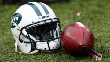 Jan 3, 2016; Orchard Park, NY, USA; A general view of a New York Jets helmet and an NFL football during the game between the Buffalo Bills and the New York Jets at Ralph Wilson Stadium. Mandatory Credit: Kevin Hoffman-USA TODAY Sports
