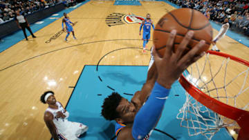 Shai Gilgeous-Alexander #2 of the OKC Thunder dunks the ball against the Philadelphia 76ers on November 15 (Photo by Zach Beeker/NBAE via Getty Images)