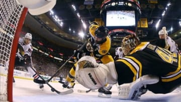 Jun 24, 2013; Boston, MA, USA; Boston Bruins defenseman Zdeno Chara (33) and goalie Tuukka Rask (40) make a save against Chicago Blackhawks right wing Patrick Kane (88) during the second period in game six of the 2013 Stanley Cup Final at TD Garden. Mandatory Credit: Harry How/Pool Photo via USA TODAY Sports