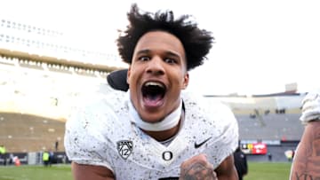 Nov 5, 2022; Boulder, Colorado, USA; Oregon Ducks linebacker Justin Flowe (10) celebrates defeating the Colorado Buffaloes at Folsom Field. Mandatory Credit: Ron Chenoy-USA TODAY Sports
