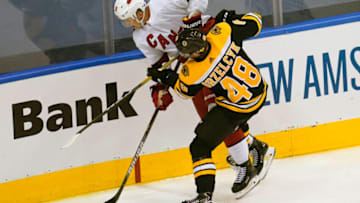 Aug 19, 2020; Toronto, Ontario, CAN; Carolina Hurricanes center Martin Necas (88) moves the puck against Boston Bruins defenseman Matt Grzelcyk (48) during the second period of game five of the first round of the 2020 Stanley Cup Playoffs at Scotiabank Arena. Mandatory Credit: John E. Sokolowski-USA TODAY Sports