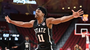 Dec 20, 2022; Lincoln, Nebraska, USA; Mississippi State Bulldogs guard Eric Reed Jr. (11) defends against the Drake Bulldogs in the second half at Pinnacle Bank Arena. Mandatory Credit: Steven Branscombe-USA TODAY Sports