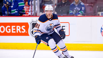 VANCOUVER, BC - SEPTEMBER 30: Edmonton Oilers center Drake Caggiula (91) looks up ice during their NHL preseason game against the Vancouver Canucks at Rogers Arena on September 30, 2017 in Vancouver, British Columbia, Canada. (Photo by Derek Cain/Icon Sportswire via Getty Images)
