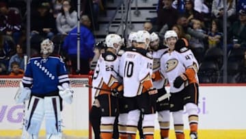 Nov 2, 2014; Denver, CO, USA; Anaheim Ducks defenseman Hampus Lindholm (47) celebrates his goal on Colorado Avalanche goalie Semyon Varlamov (1) with left wing Patrick Maroon (19) and defenseman Francois Beauchemin (23) and right wing Corey Perry (10) in the second period at Pepsi Center. Mandatory Credit: Ron Chenoy-USA TODAY Sports