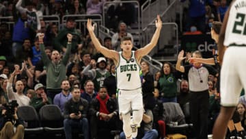 Mar 2, 2022; Milwaukee, Wisconsin, USA; Milwaukee Bucks guard Grayson Allen (7) reacts after scoring a basket during the third quarter against the Miami Heat at Fiserv Forum. Mandatory Credit: Jeff Hanisch-USA TODAY Sports