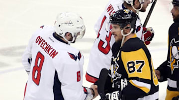 May 10, 2016; Pittsburgh, PA, USA; Washington Capitals left wing Alex Ovechkin (8) and Pittsburgh Penguins center Sidney Crosby (87) shake hands after game six of the second round of the 2016 Stanley Cup Playoffs at the CONSOL Energy Center. The Pens won 4-3 in overtime to win the series 4 games to 2. Mandatory Credit: Charles LeClaire-USA TODAY Sports