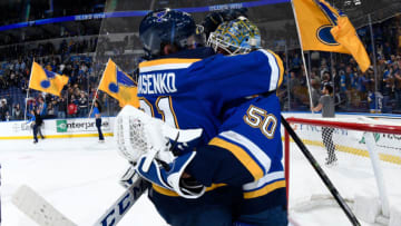 ST. LOUIS, MO - FEBRUARY 12: Vladimir Tarasenko #91 of the St. Louis Blues and Jordan Binnington #50 of the St. Louis Blues celebrate their victory over the New Jersey Devils at Enterprise Center on February 12, 2019 in St. Louis, Missouri. (Photo by Scott Rovak/NHLI via Getty Images)