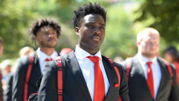 Linebacker Ernest Hausmann #15 of the Nebraska Cornhuskers walks to the stadium (Photo by Steven Branscombe/Getty Images)