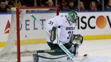 NEW YORK, NY - JANUARY 20: John Lethemon #31 of the Michigan State Spartans blocks a shot against the Minnesota Golden Gophers in the second period during their game at Madison Square Garden on January 20, 2018 in New York City. (Photo by Abbie Parr/Getty Images)