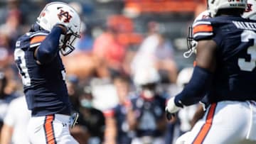 Auburn football linebacker Joko Willis (33) celebrates after making a stop in the backfield at Jordan-Hare Stadium in Auburn, Ala., on Saturday, Sept. 11, 2021. Auburn Tigers defeated Alabama State Hornets 60-0.