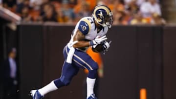Aug 8, 2013; Cleveland, OH, USA; St. Louis Rams running back Isaiah Pead (24) runs the ball against the Cleveland Browns at FirstEnergy Stadium. Mandatory Credit: Rick Osentoski-USA TODAY Sports