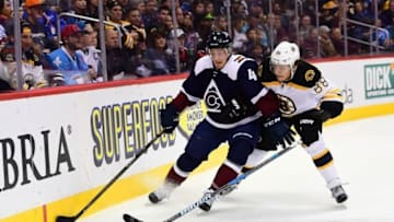 Nov 13, 2016; Denver, CO, USA; Boston Bruins right wing David Pastrnak (88) and Colorado Avalanche defenseman Tyson Barrie (4) in the first period at Pepsi Center. Mandatory Credit: Ron Chenoy-USA TODAY Sports