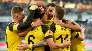 WOLFSBURG, GERMANY - NOVEMBER 03: Marco Reus of Borussia Dortmund celebrates after scoring his team`s first goal with team mates during the Bundesliga match between VfL Wolfsburg and Borussia Dortmund at Volkswagen Arena on November 3, 2018 in Wolfsburg, Germany. (Photo by TF-Images/Getty Images)