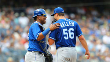 NEW YORK, NY - JULY 28: Salvador Perez #13 and Brad Keller #56 of the Kansas City Royals talk during the game against the New York Yankees at Yankee Stadium on July 28, 2018 in the Bronx borough of New York City. Kansas City Royals defeated the New York Yankees 10-5. (Photo by Mike Stobe/Getty Images)