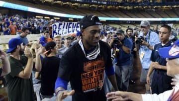 October 15, 2015; Los Angeles, CA, USA; New York Mets right fielder Curtis Granderson (3) celebrates the 3-2 victory against Los Angeles Dodgers in game five of NLDS at Dodger Stadium. Mandatory Credit: Richard Mackson-USA TODAY Sports