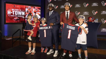 Apr 28, 2023; Houston, TX, USA; Houston Texans Texans linebacker Will Anderson Jr. (left), third overall pick in the 2023 NFL Draft, and quarterback CJ Stroud, second overall pick in the 2023 NFL Draft, pose with fans at a press conference at NRG Stadium. Mandatory Credit: Thomas Shea-USA TODAY Sports