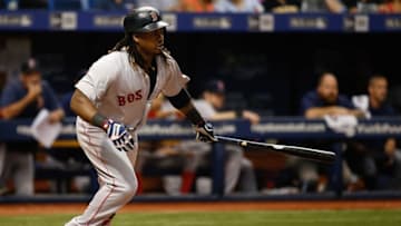 Sep 24, 2016; St. Petersburg, FL, USA; Boston Red Sox first baseman Hanley Ramirez (13) at bat against the Tampa Bay Rays at Tropicana Field. Mandatory Credit: Kim Klement-USA TODAY Sports