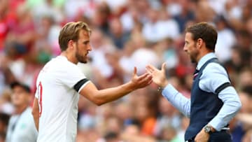 LONDON, ENGLAND - JUNE 02: Harry Kane of England shakes hands with Gareth Southgate Manager of England after being substituted during the International Friendly match between England and Nigeria at Wembley Stadium on June 2, 2018 in London, England. (Photo by Clive Rose/Getty Images)