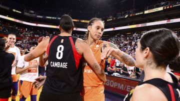 PHOENIX, AZ - MAY 31: Brittney Griner #42 of Phoenix Mercury hugs Liz Cambage #8 of Las Vegas Aces after the game on May 31, 2019 at the Talking Stick Resort Arena in Phoenix, Arizona. NOTE TO USER: User expressly acknowledges and agrees that, by downloading and/or using this photograph, user is consenting to the terms and conditions of the Getty Images License Agreement. Mandatory Copyright Notice: Copyright 2019 NBAE (Photo by Barry Gossage/NBAE via Getty Images)