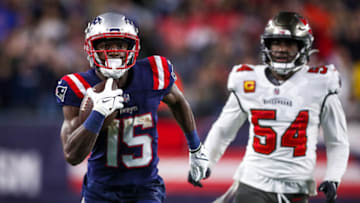 Oct 3, 2021; Foxborough, Massachusetts, USA; New England Patriots receiver Nelson Agholor (15) catches a pass against the Tampa Bay Buccaneers at Gillette Stadium. Mandatory Credit: Paul Rutherford-USA TODAY Sports