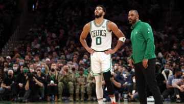 BOSTON, MASSACHUSETTS - NOVEMBER 10: Jayson Tatum #0 of the Boston Celtics talks with head coach Ime Udoka during the second half of the game against the Toronto Raptors at TD Garden on November 10, 2021 in Boston, Massachusetts. NOTE TO USER: User expressly acknowledges and agrees that, by downloading and or using this photograph, User is consenting to the terms and conditions of the Getty Images License Agreement. (Photo by Maddie Meyer/Getty Images)