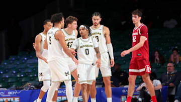 Nov 23, 2023; Paradise Island, BAHAMAS; Michigan Wolverines guard Dug McDaniel (0) celebrates with teammates during the second half against the Stanford Cardinal at Imperial Arena. Mandatory Credit: Kevin Jairaj-USA TODAY Sports