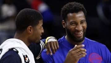 Oct 6, 2015; Auburn Hills, MI, USA; Detroit Pistons center Andre Drummond (right) and Indiana Pacers forward Paul George (left) share a laugh after the game at The Palace of Auburn Hills. Pacers win 115-112. Mandatory Credit: Raj Mehta-USA TODAY Sports