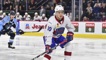 LAVAL, QC - NOVEMBER 15: Jake Evans #10 of the Laval Rocket skates against the Milwaukee Admirals during the second period at Place Bell on November 15, 2019 in Laval, Canada. The Milwaukee Admirals defeated the Laval Rocket 5-2. (Photo by Minas Panagiotakis/Getty Images)