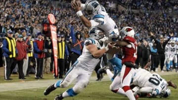 Jan 24, 2016; Charlotte, NC, USA; Carolina Panthers quarterback Cam Newton (1) dives for a touchdown during the third quarter against the Arizona Cardinals in the NFC Championship football game at Bank of America Stadium. Mandatory Credit: Jeremy Brevard-USA TODAY Sports