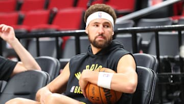 PORTLAND, OREGON - OCTOBER 04: Klay Thompson #11 of the Golden State Warriors looks on before the preseason game against the Portland Trail Blazers at Moda Center on October 04, 2021 in Portland, Oregon. NOTE TO USER: User expressly acknowledges and agrees that, by downloading and or using this photograph, User is consenting to the terms and conditions of the Getty Images License Agreement. (Photo by Abbie Parr/Getty Images)